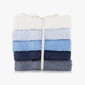 Soft pastel towel set for bathroom decor and comfort.