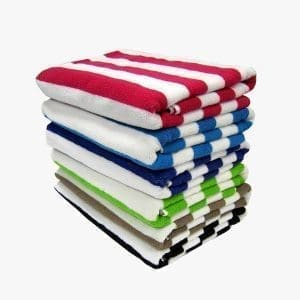 Soft, colorful striped towels stacked neatly for home or beach use.