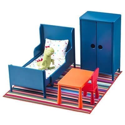 Modern children's bedroom furniture set with bed, wardrobe, and table in vibrant colors